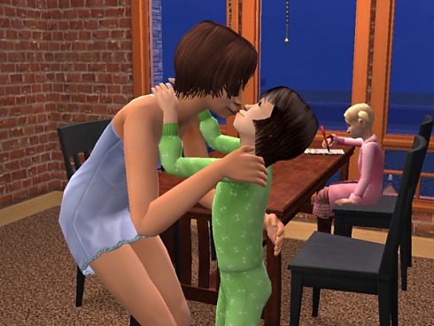 Andi gives Kara a birthday kiss.